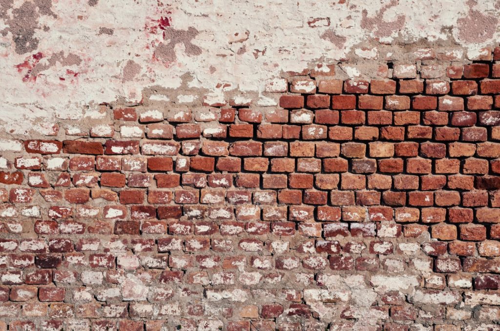 how to clean dirty brick walls